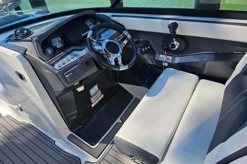 Slide: The Image of 2020 Monterey 275SS Super Sport boat cockpit with steering wheel and controls. - 24
