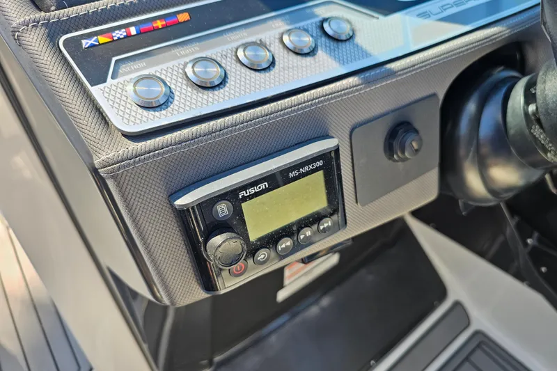 Slide: The Image of Control panel of a 2020 Monterey 275SS Super Sport boat with Fusion MS-NRX300. - 26