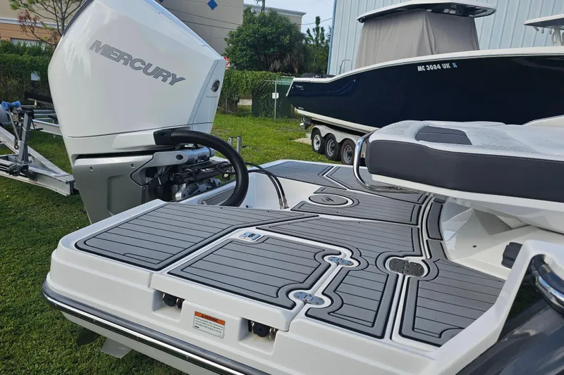 Slide: The Image of 2020 Monterey 275SS Super Sport boat with Mercury engine, featuring sleek deck design. - 5