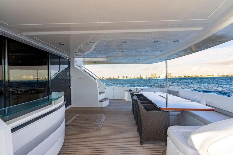 Slide: The Image of Luxurious deck of 2010 Princess 95 Motor Yacht with ocean view and elegant seating. - 101