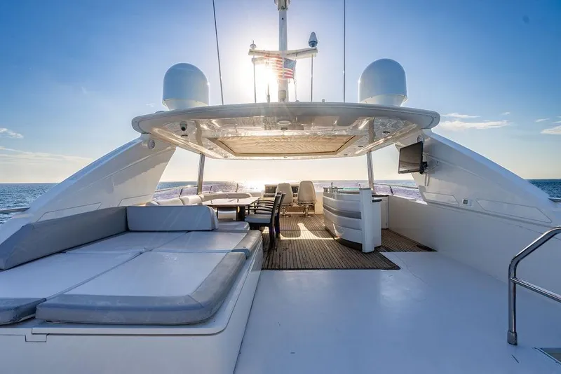 Slide: The Image of Luxurious 2010 Princess 95 Motor Yacht deck with ocean view and seating area. - 117
