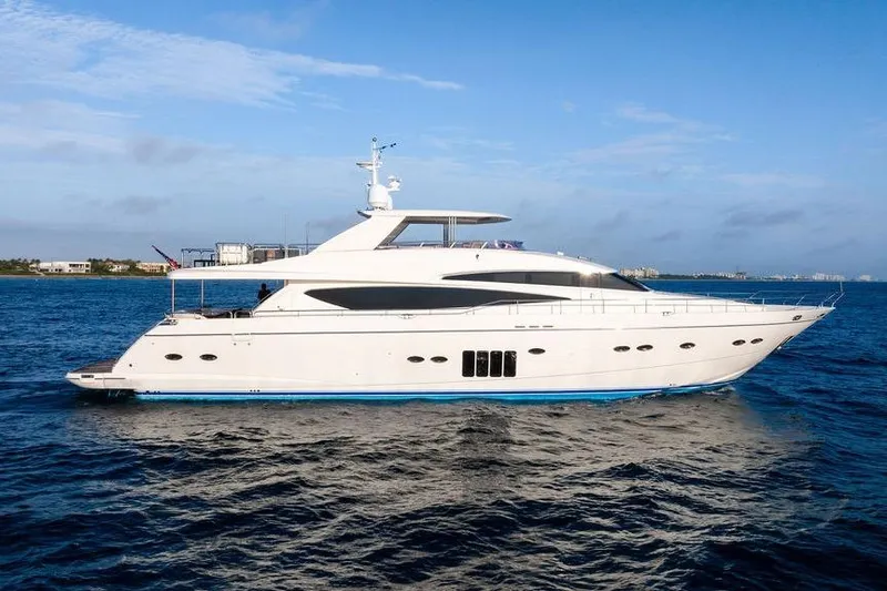 Slide: The Image of Luxury 2010 Princess 95 Motor Yacht cruising on open water. - 12