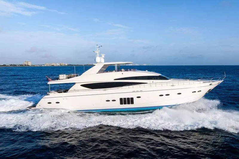 Slide: The Image of Luxurious 2010 Princess 95 Motor Yacht cruising on open sea under clear blue sky. - 14