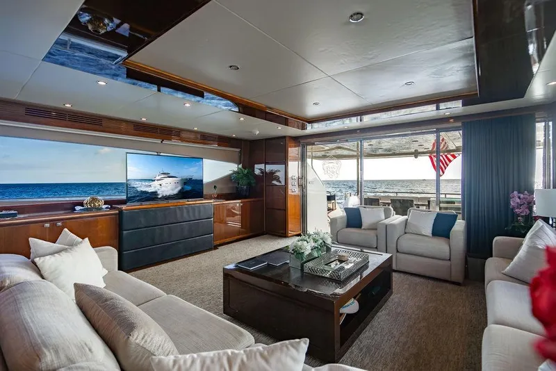 Slide: The Image of Luxurious interior of a 2010 Princess 95 Motor Yacht with elegant seating and ocean view. - 142