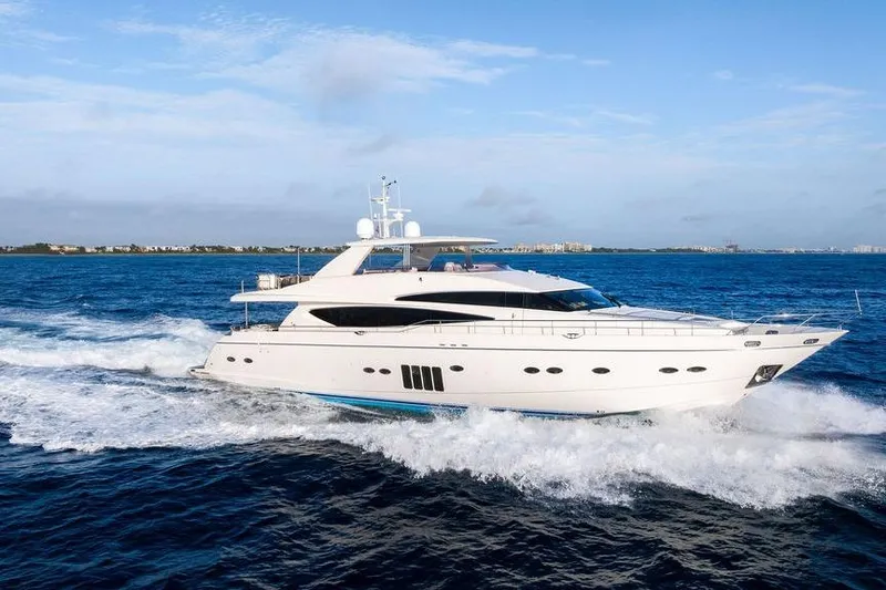 Slide: The Image of Luxurious 2010 Princess 95 Motor Yacht cruising on open blue sea. - 15