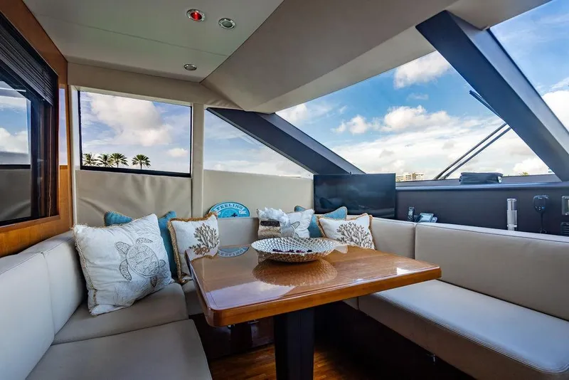 Slide: The Image of Luxurious interior of 2010 Princess 95 Motor Yacht with elegant seating and decor. - 159
