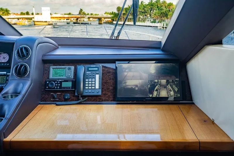 Slide: The Image of Control panel of 2010 Princess 95 Motor Yacht with navigation and communication equipment. - 167