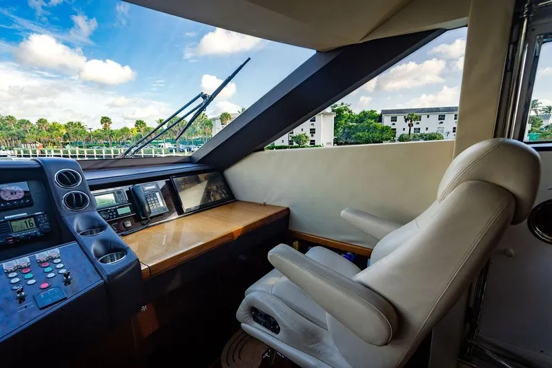 Slide: The Image of Luxurious helm of 2010 Princess 95 Motor Yacht with modern navigation equipment. - 168