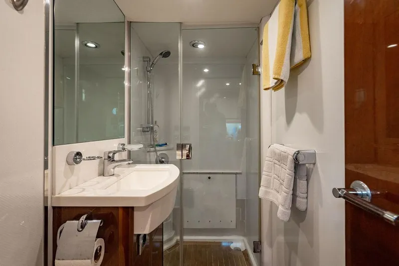 Slide: The Image of Bathroom interior of 2010 Princess 95 Motor Yacht with shower and sink. - 173