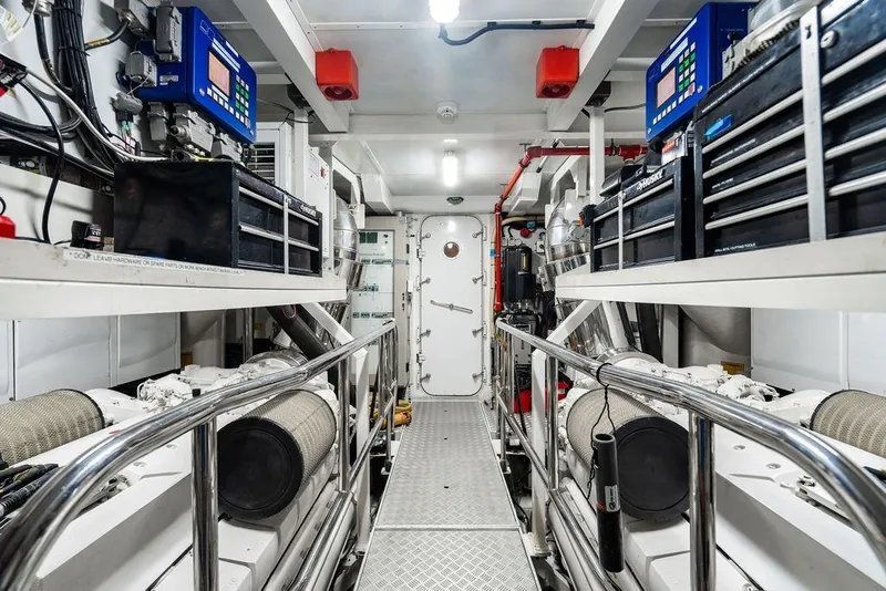 Slide: The Image of Engine room of 2010 Princess 95 Motor Yacht, featuring advanced equipment and control panels. - 182