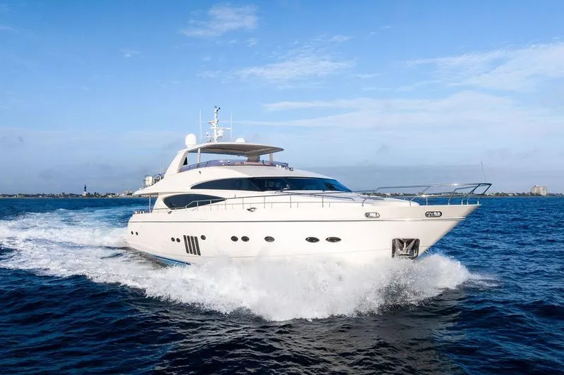 Slide: The Image of Luxury 2010 Princess 95 Motor Yacht cruising on open water. - 21