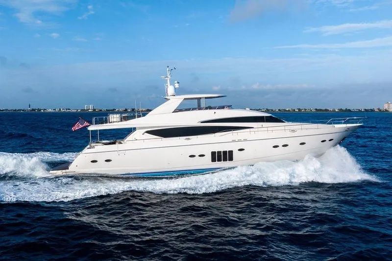 Slide: The Image of Luxury 2010 Princess 95 Motor Yacht cruising on open water. - 29