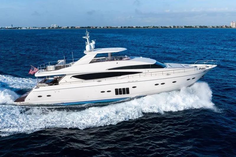 Slide: The Image of 2010 Princess 95 Motor Yacht cruising on open blue sea. - 36