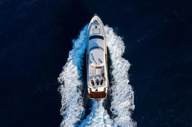Slide: The Image of Aerial view of 2010 Princess 95 Motor Yacht cruising on open water. - 37