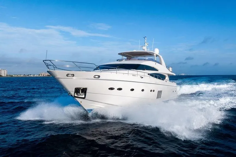 Slide: The Image of Luxurious 2010 Princess 95 Motor Yacht cruising on open sea under clear blue sky. - 39