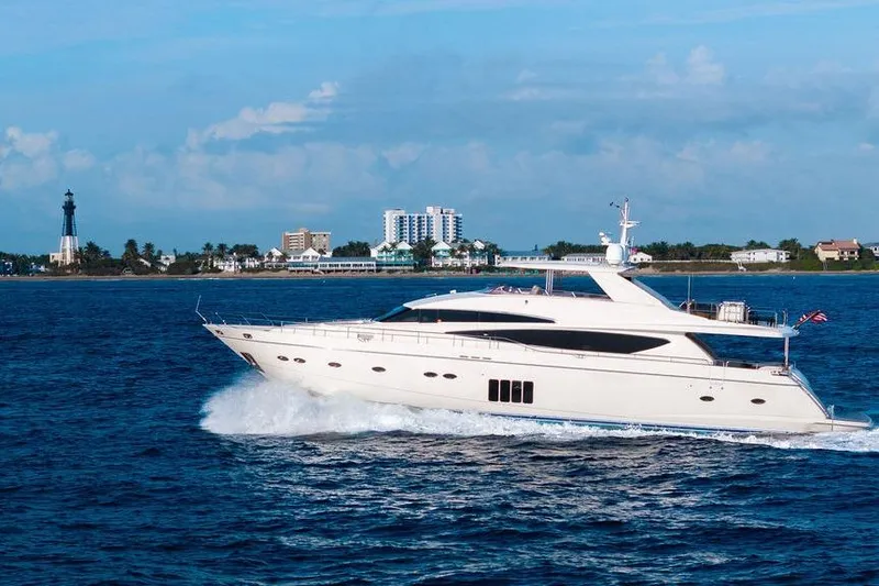 Slide: The Image of Luxurious 2010 Princess 95 Motor Yacht cruising near coastal cityscape. - 50