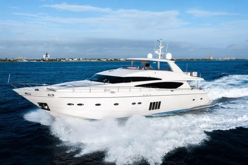 Slide: The Image of Luxurious 2010 Princess 95 Motor Yacht cruising on open blue waters. - 56