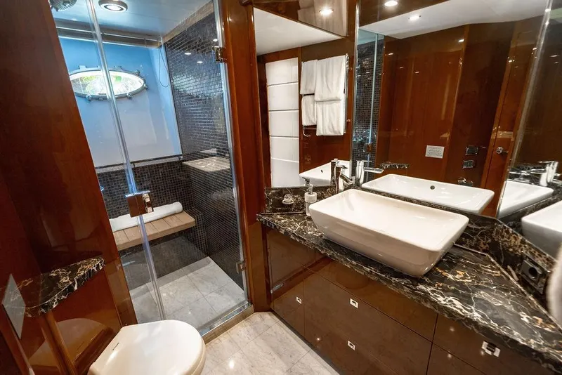 Slide: The Image of Luxurious bathroom on 2010 Princess 95 Motor Yacht with marble countertop and modern fixtures. - 65