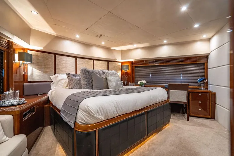 Slide: The Image of Luxurious bedroom interior of 2010 Princess 95 Motor Yacht with elegant furnishings. - 71