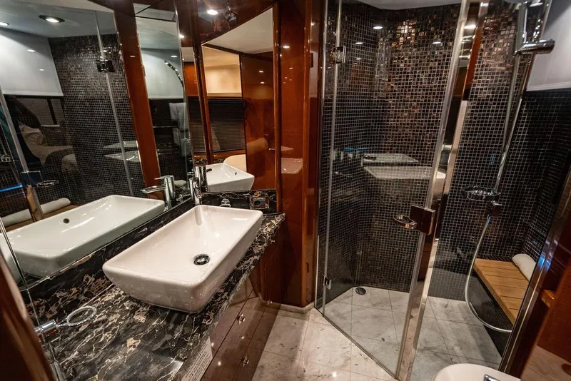 Slide: The Image of Luxurious bathroom on 2010 Princess 95 Motor Yacht with elegant fixtures and modern design. - 74