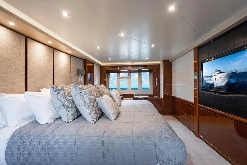 Slide: The Image of Luxurious bedroom interior of 2010 Princess 95 Motor Yacht with elegant decor and ocean view. - 79