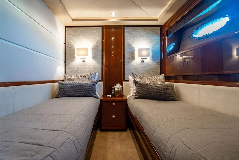 Slide: The Image of Luxurious twin cabin interior of 2010 Princess 95 Motor Yacht with elegant decor. - 89