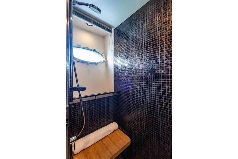 Slide: The Image of Luxurious shower with mosaic tiles in 2010 Princess 95 Motor Yacht. - 93