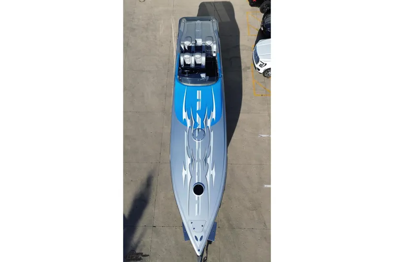 Slide: The Image of Aerial view of 2007 Hustler 41 Razor speedboat with blue and gray design. - 41