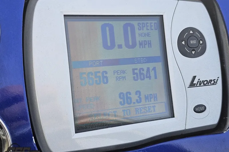 Slide: The Image of Livorsi display on 2007 Hustler 41 Razor showing RPM and speed data. - 65