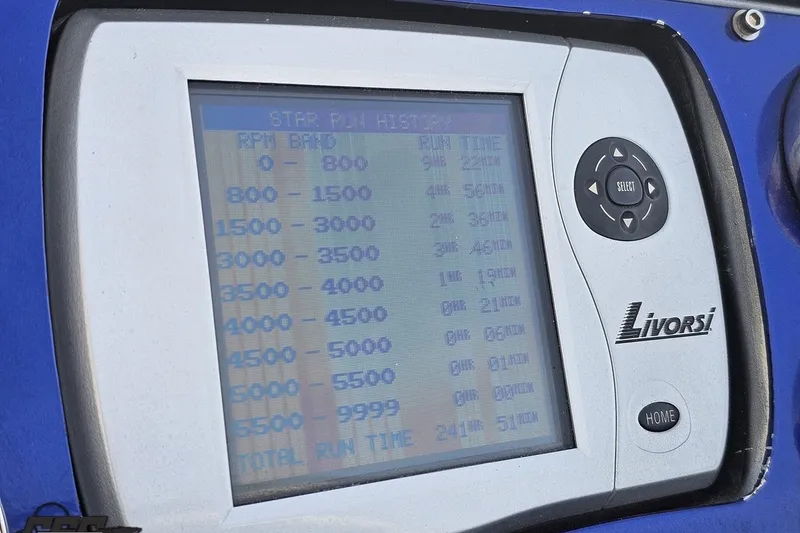 Slide: The Image of Display screen showing RPM and run time data on a 2007 Hustler 41 Razor. - 67