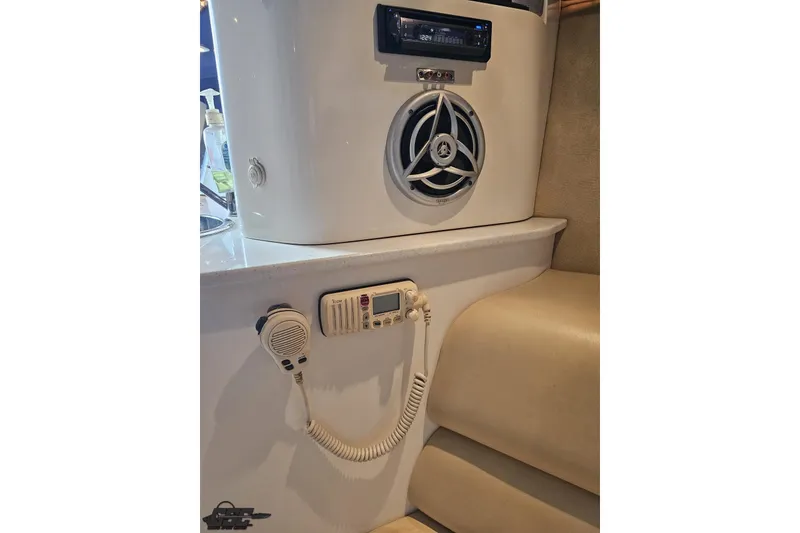 Slide: The Image of 2007 Hustler 41 Razor interior with speaker and radio equipment. - 84