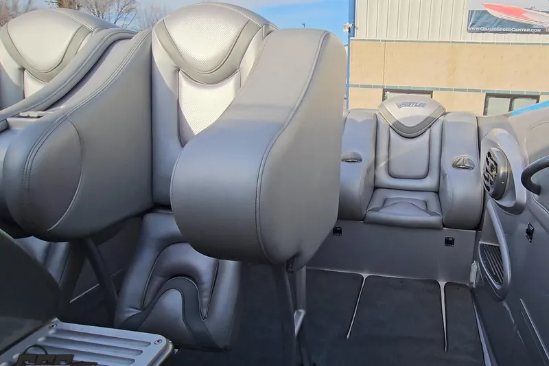 Slide: The Image of 2007 Hustler 41 Razor interior with sleek gray leather seating and modern design. - 95