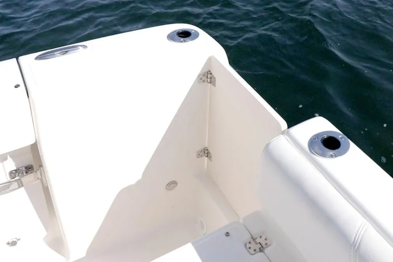 Slide: The Image of Manufacturer Provided Image: 2025 Sea Born LX26 Center Console boat interior detail with rod holders. - 8