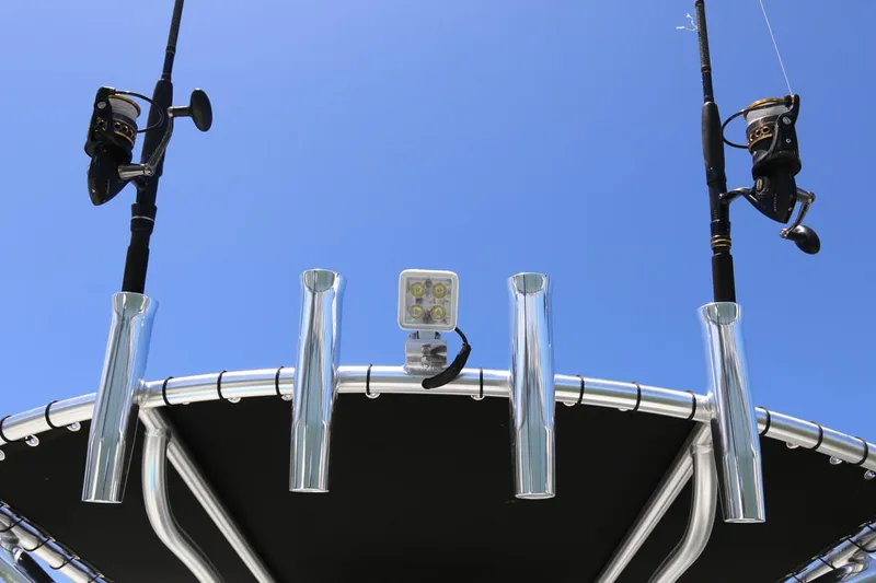 Slide: The Image of Manufacturer Provided Image: Fishing rod holders and cooler on Sea Born LX21 boat. - 9