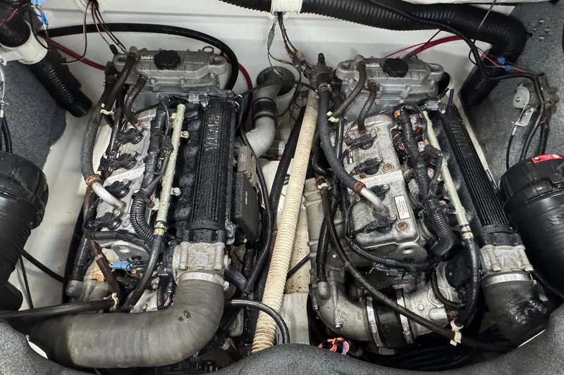 Slide: The Image of Engine compartment of a 2012 Yamaha SX210 boat with dual engines. - 8