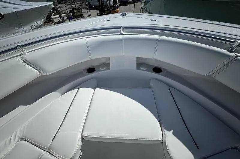 Slide: The Image of 2025 Sportsman Open 352 Center Console boat with luxurious white seating. - 13