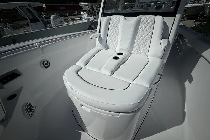 Slide: The Image of Luxurious seating on 2025 Sportsman Open 352 Center Console boat, featuring elegant white upholstery. - 15