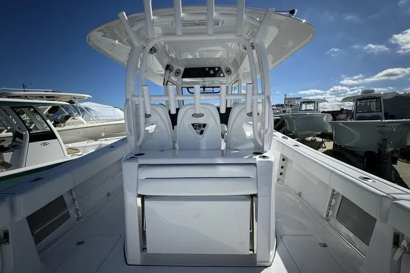 Slide: The Image of 2025 Sportsman Open 352 Center Console boat interior with seating and console. - 22