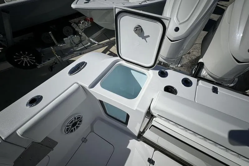 Slide: The Image of 2025 Sportsman Open 352 Center Console boat interior with open storage compartment. - 27