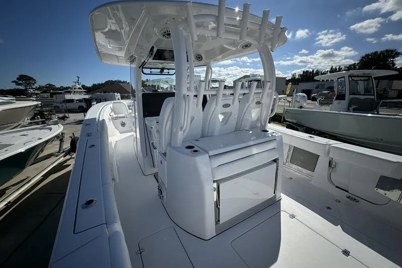 Slide: The Image of 2025 Sportsman Open 352 Center Console boat, sleek design, spacious deck, modern features. - 29
