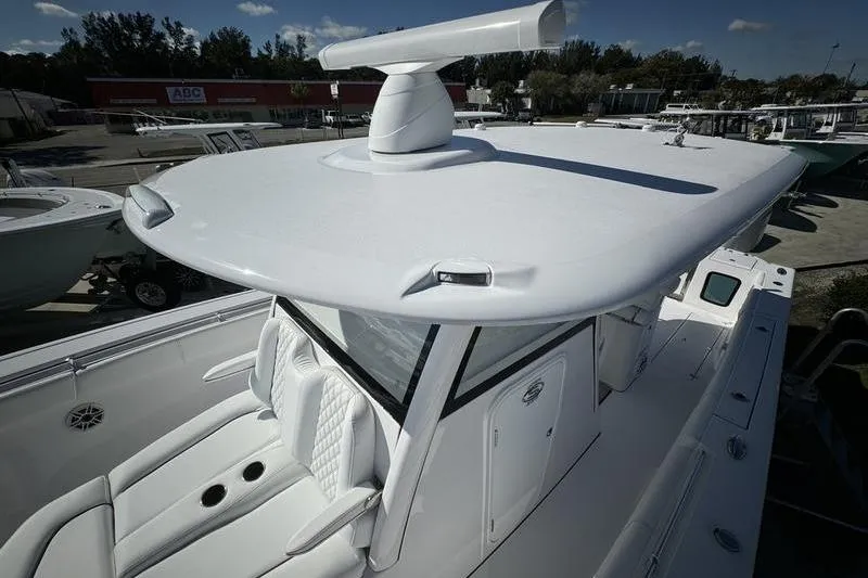 Slide: The Image of 2025 Sportsman Open 352 Center Console boat with sleek design and advanced features. - 31