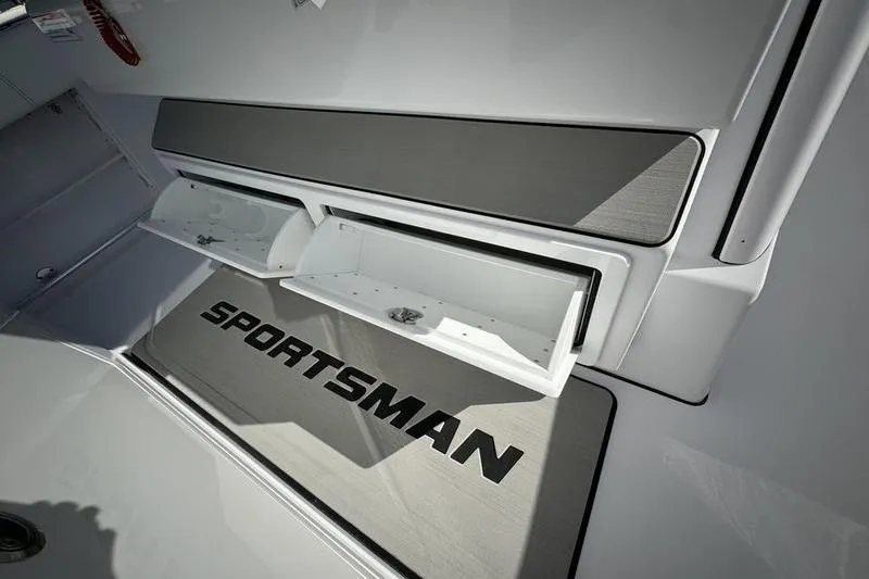 Slide: The Image of 2025 Sportsman Open 352 Center Console boat interior with storage compartments open. - 51