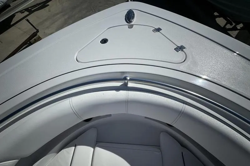 Slide: The Image of 2025 Sportsman Open 352 Center Console boat bow with sleek design and seating. - 6