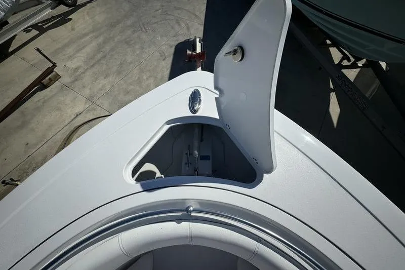 Slide: The Image of 2025 Sportsman Open 352 Center Console boat with open storage compartment. - 7