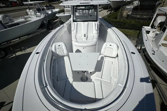 Slide: The Image of 2025 Sportsman Open 352 Center Console boat with spacious seating and sleek design. - 9