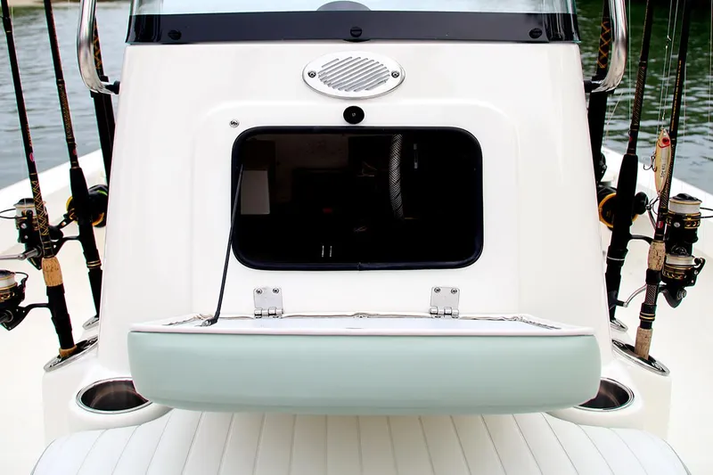 Slide: The Image of Manufacturer Provided Image: 2025 Sea Born FX22 Bay boat with fishing rods and storage compartment. - 6