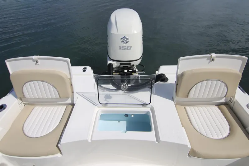Slide: The Image of Manufacturer Provided Image: 2025 Sea Born FX21 Bay boat with Suzuki 150 engine, featuring dual seats and storage compartments. - 11