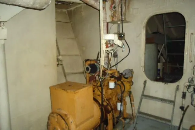 Slide: The Image of Interior of a 1973 Commercial Boats Shrimp Trawler engine room with machinery. - 6