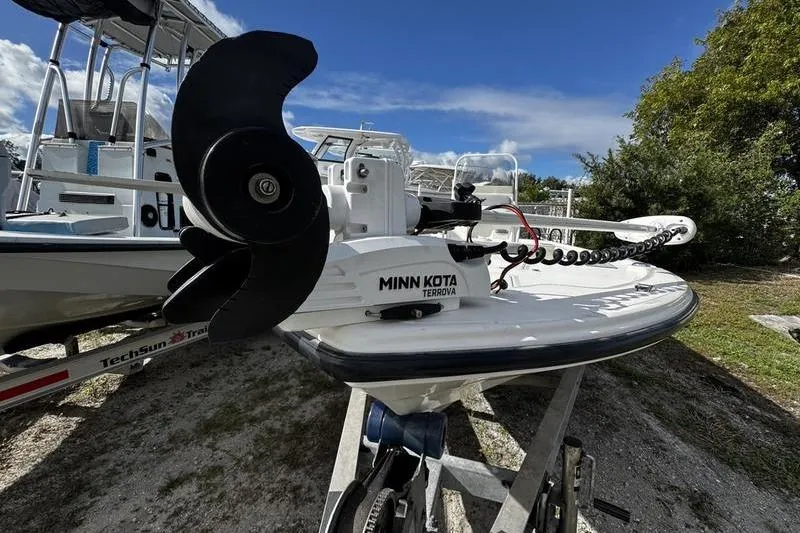 Slide: The Image of 2022 Mako 18 LTS boat with Minn Kota Terrova trolling motor on trailer. - 6