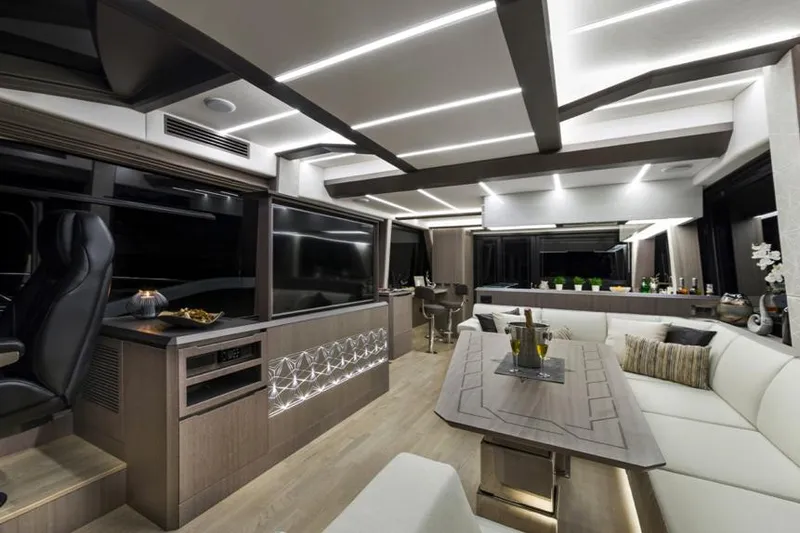 Slide: The Image of Manufacturer Provided Image: Luxurious interior of 2025 Galeon 640 Fly yacht with modern design and ambient lighting. - 16